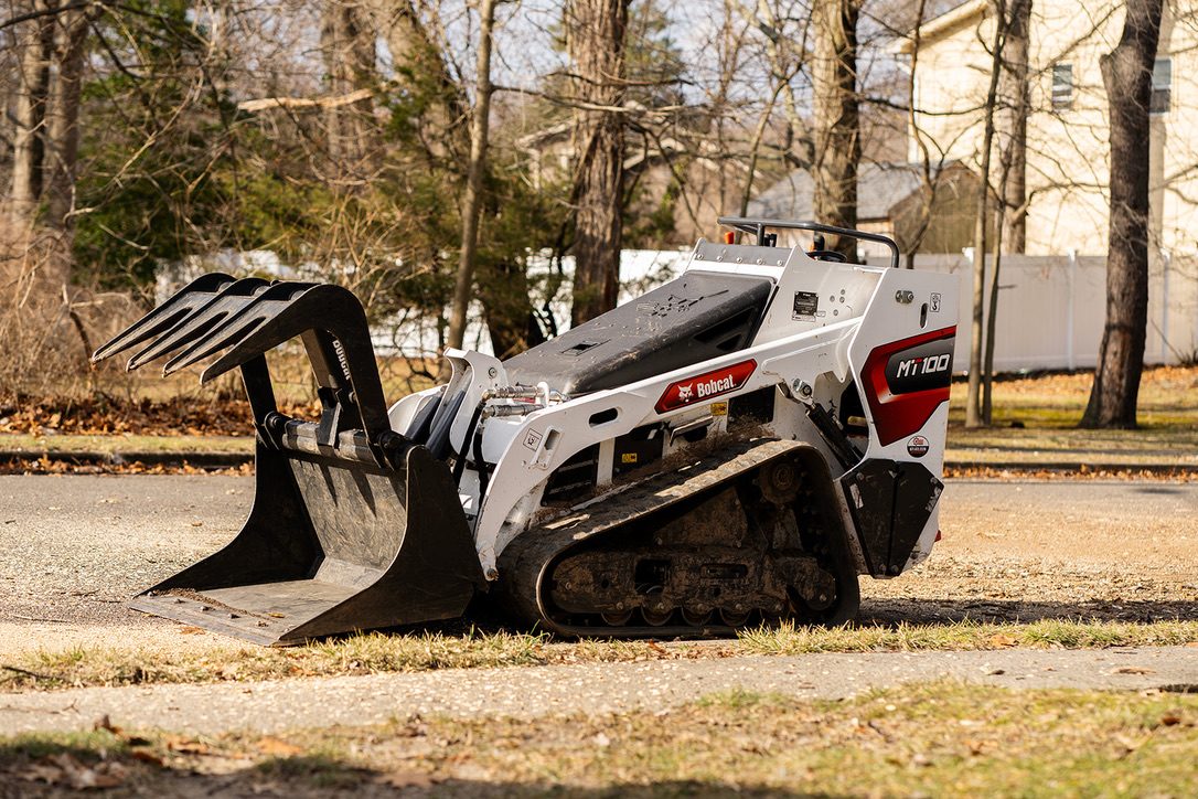 Crane-assisted tree removal by Pro-Stump Tree Service — 40-ton Terex Stinger